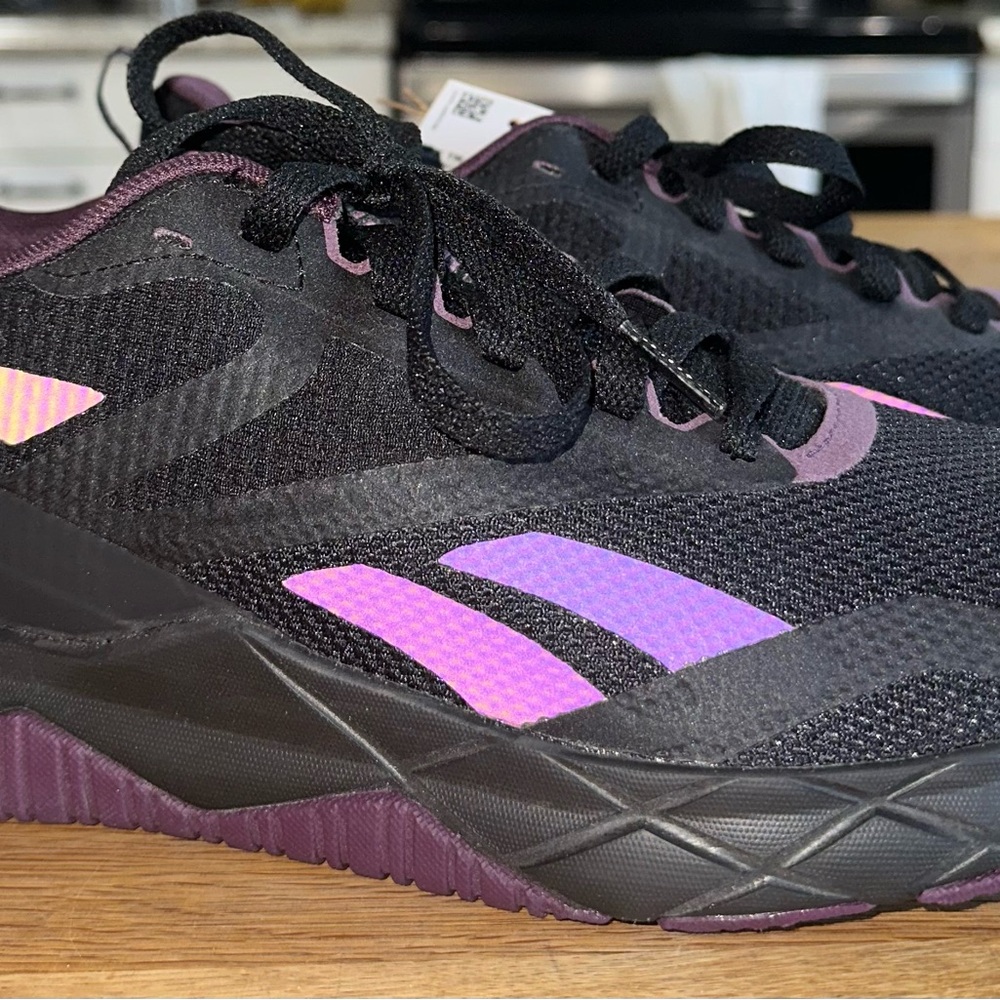 Reebok NFX Women’s Black Athletic Shoes with Purple Accents
